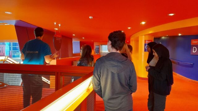 A young person receiving a tour of Lowry in Salford