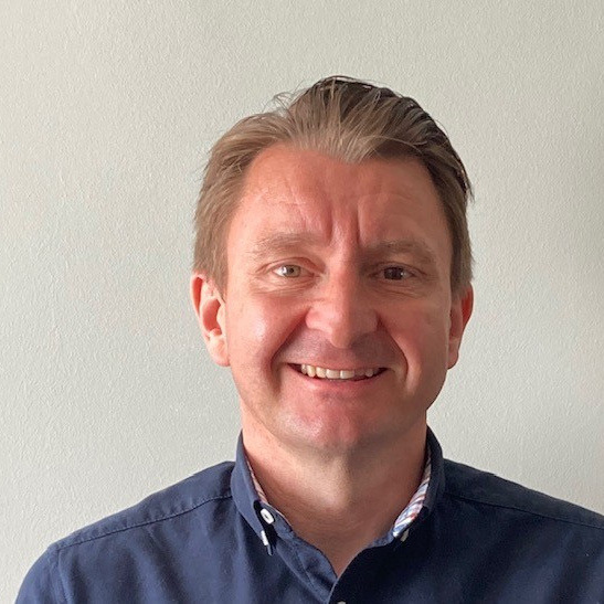 A headshot of Neil McCaskill, Team Manager