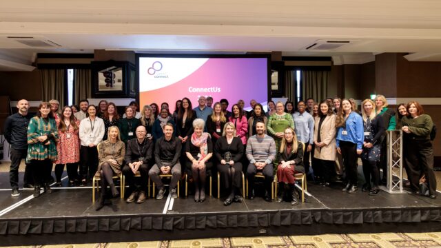 A group picture of all Career Connect schools staff at our recent staff awards. They fill the whole stage and are smiling.