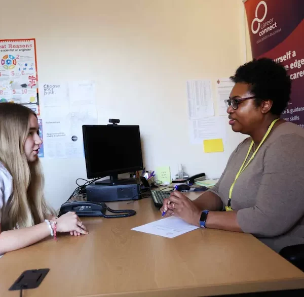 A Career Connect adviser and a student in a careers interview.