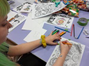 A display of tattoo art images as part of the Discover Your Future art workshop.