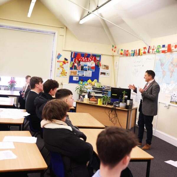 A careers adviser presenting a session on CVs to a class