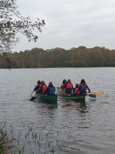 Once aboard their canoes, the participants had to work in teams to paddle across the lake, finding and solving a series of riddles with clues hidden amongst the reeds