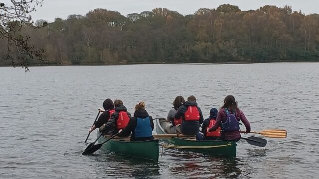 Once aboard their canoes, the participants had to work in teams to paddle across the lake, finding and solving a series of riddles with clues hidden amongst the reeds