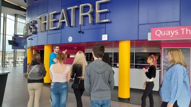 A group of young people (pictured) at the start of their behind-the-scenes tour of The Lowry