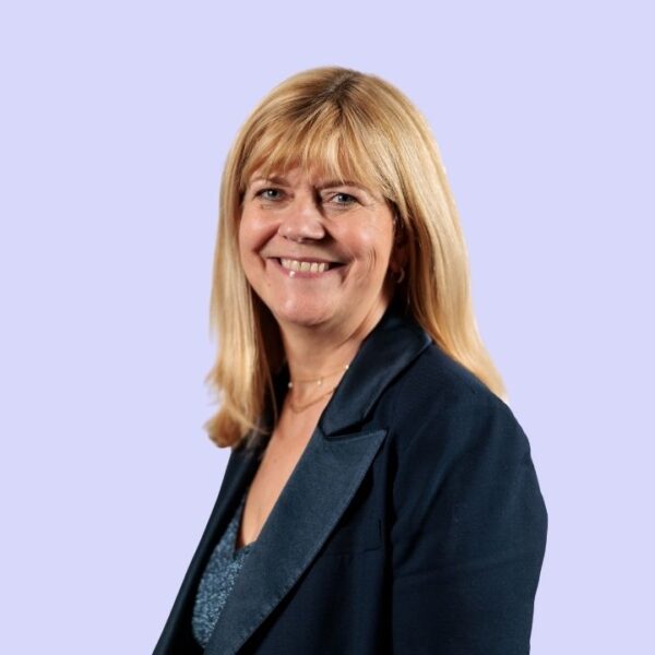 A headshot of Career Connect CEO, Sheila Clarke on a light blue background