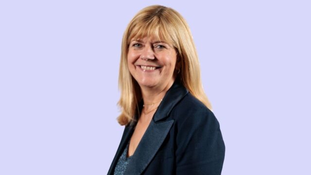 A headshot of Career Connect CEO, Sheila Clarke on a light blue background