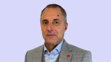 A headshot of Simon Bean, director of business development and fundraising