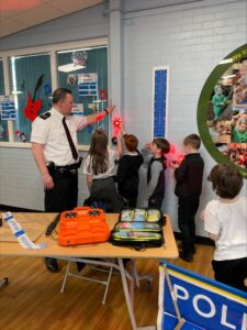 Primary pupils are joined by the police for a careers lesson.