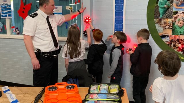 Primary pupils are joined by the police for a careers lesson.