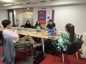 A group of Career Connect youth ambassadors taking part in a skills exercise led by Youth Participation Co-ordinator Alicia Murray. They are in lively conversation.