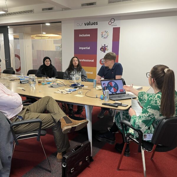 A group of Career Connect youth ambassadors taking part in a skills exercise led by Youth Participation Co-ordinator Alicia Murray. They are in lively conversation.