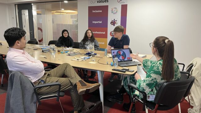 A group of Career Connect youth ambassadors taking part in a skills exercise led by Youth Participation Co-ordinator Alicia Murray. They are in lively conversation.