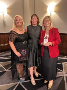 Career Connect CEO Sheila Clark (R) receives the Careers Provider of the Year award alongside Director of Operations Sarah Vaughan (L)