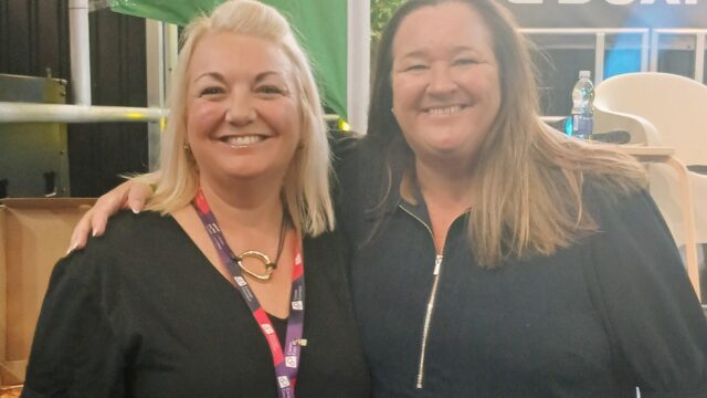 Sarah Vaughan (Career Connect) standing smiling with Cllr Marion Atkinson from Sefton.