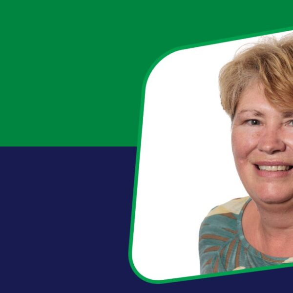 A banner featuring an image of a smiling training adviser.