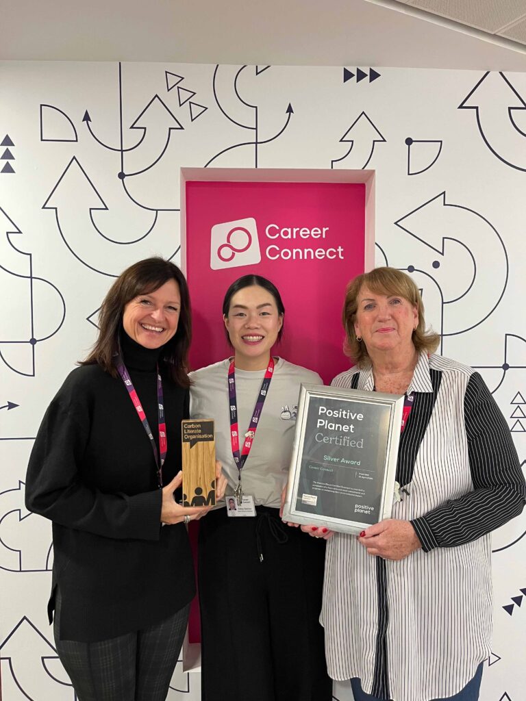 Gill, Jenny and Lynn pictured holding our Bronze Accreditation award from the Carbon Literacy Organisation and our Silver Accreditation from Positive Planet for our work to help protect the environment.