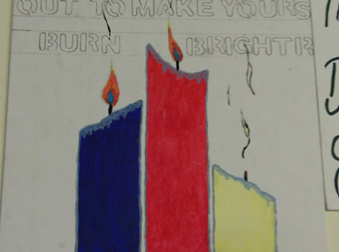 A hand-drawn poster featuring three coloured candles - one of which has gone out. Above are the words "Don't blow someone else's candle out to make yours burn brighter."