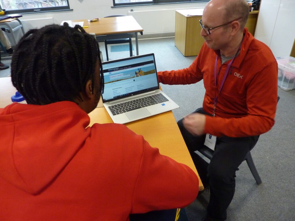 Career Connect adviser, Steve, talking to a young person.