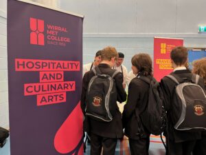 Some male students find out about careers in hospitality and the culinary arts from Wirral Met College.