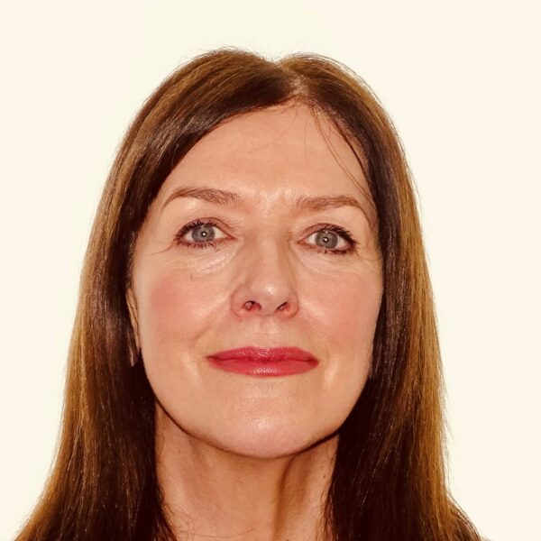 a headshot photo of Kath Wyke smiling