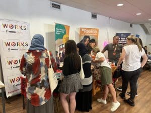 An image of young people exploring opportunities at Liverpool Career Fest.