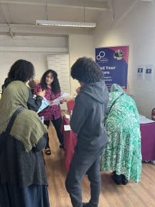 An image of young people talking to careers advisers at Liverpool Career Fest.