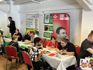 An image of young people talking to various employers at Liverpool Career Fest.