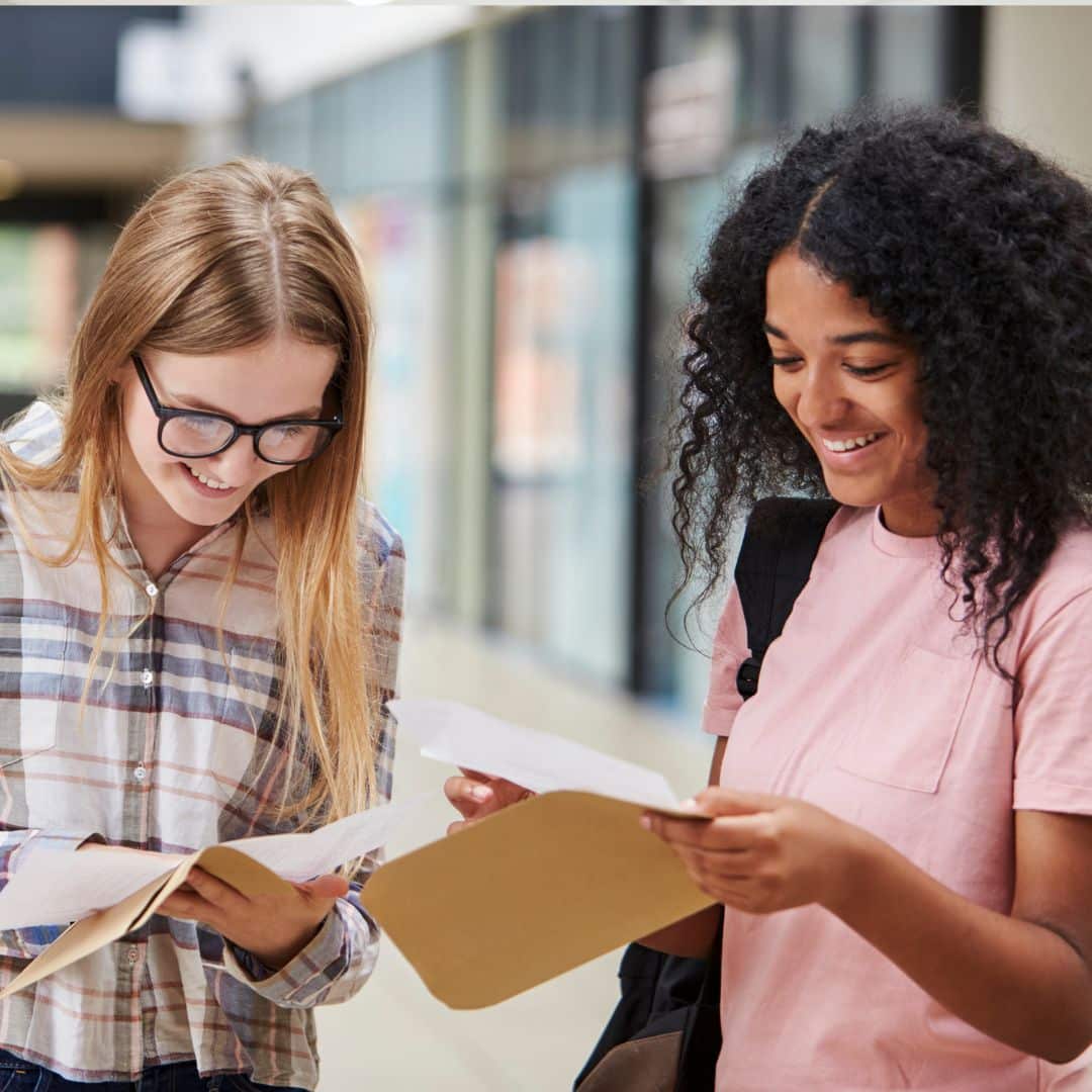 Two girls checking out their GCSE results